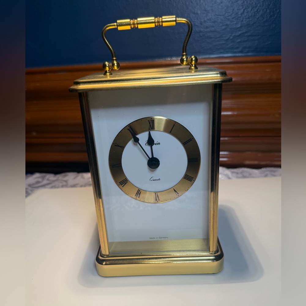 Vintage Elgin quartz carriage clock in a polished brass case